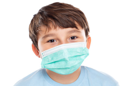 Child kid little boy wearing face mask against virus portrait isolated on a white backgroundの写真素材