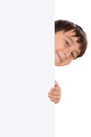 Child kid looking at empty blank sign copyspace copy space marketing ad advert isolated on a white background portrait formatの写真素材