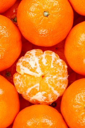 Mandarin tangerine clementine fruits mandarins tangerines clementines fruit background from above portrait format top viewの写真素材