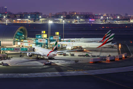 Dubai, United Arab Emirates - May 27, 2021: Emirates Boeing 777-300ER airplanes at Dubai airport (DXB) in the United Arab Emirates.のeditorial素材