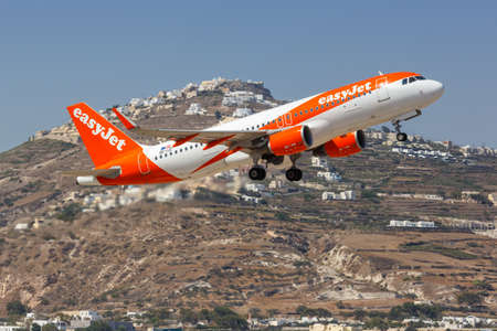 Santorini, Greece - August 4, 2021: EasyJet Airbus A320 airplane at Santorini airport (JTR) in Greece.のeditorial素材