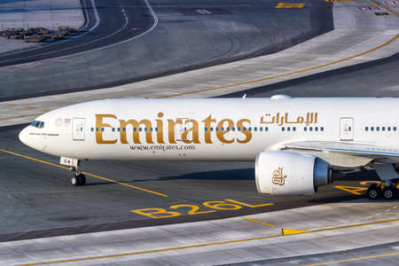Dubai, United Arab Emirates - May 27, 2021: Emirates Boeing 777-300ER airplane at Dubai airport (DXB) in the United Arab Emirates.のeditorial素材