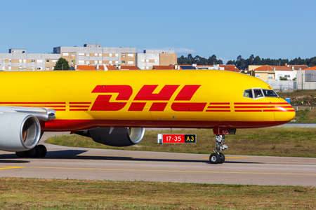 Porto, Portugal - September 21, 2021: DHL European Air Transport EAT Boeing 757-200SF airplane at Porto airport (OPO) in Portugal.のeditorial素材