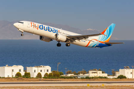 Santorini, Greece - August 4, 2021: FlyDubai Boeing 737 MAX 9 airplane at Santorini airport (JTR) in Greece.のeditorial素材