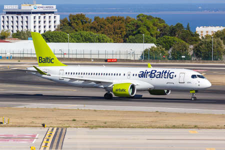 Lisbon, Portugal - September 24, 2021: Air Baltic Airbus A220-300 airplane at Lisbon airport (LIS) in Portugal.のeditorial素材