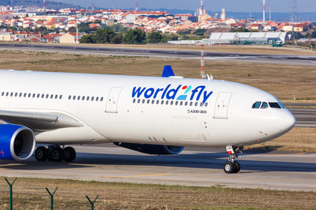 Lisbon, Portugal - September 24, 2021: World2Fly Airbus A330-300 airplane at Lisbon airport (LIS) in Portugal.のeditorial素材