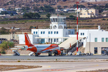 Santorini, Greece - August 4, 2021: EasyJet Airbus A320 airplane at Santorini airport (JTR) in Greece.のeditorial素材