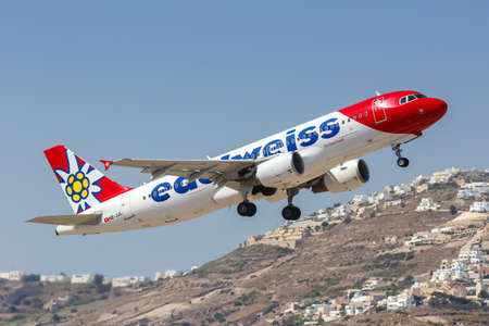 Santorini, Greece - August 4, 2021: Edelweiss Airbus A320 airplane at Santorini airport (JTR) in Greece.のeditorial素材