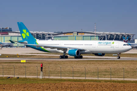 Stuttgart, Germany - March 24, 2021: Aer Lingus Airbus A330-300 airplane at Stuttgart airport (STR) in Germany.のeditorial素材