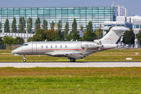 Munich, Germany - September 9, 2021: VistaJet Bombardier Challenger 350 airplane at Munich airport (MUC) in Germany.のeditorial素材