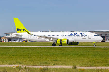 Stuttgart, Germany - September 8, 2021: Air Baltic Airbus A220-300 airplane at Stuttgart airport (STR) in Germany.のeditorial素材