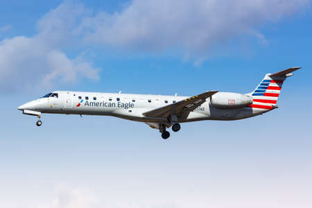 New York, United States - February 29, 2020: American Eagle Envoy Air Embraer 140 airplane at New York JFK airport in the United States.のeditorial素材