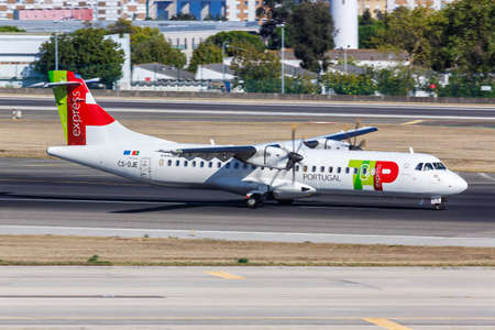 Lisbon, Portugal - September 24, 2021: TAP Portugal Express ATR 72-600 airplane at Lisbon airport (LIS) in Portugal.のeditorial素材