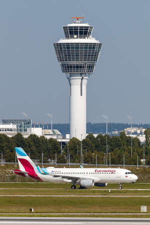 Munich, Germany - September 9, 2021: Eurowings Airbus A320 airplane at Munich airport (MUC) in Germany.のeditorial素材