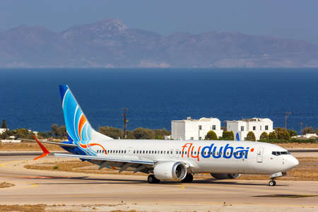 Santorini, Greece - August 4, 2021: FlyDubai Boeing 737 MAX 9 airplane at Santorini airport (JTR) in Greece.のeditorial素材