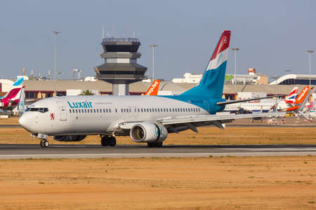 Faro, Portugal - September 25, 2021: Luxair Boeing 737-800 airplane at Faro airport (FAO) in Portugal.のeditorial素材