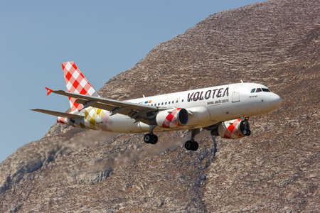 Santorini, Greece - August 4, 2021: Volotea Airbus A319 airplane at Santorini airport (JTR) in Greece.のeditorial素材