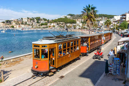 Port de Soller, Spain - October 21, 2021: Ancient tram Tranvia de Soller public transport transit transportation traffic on Mallorca in Port de Soller, Spain.のeditorial素材