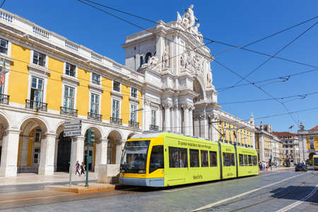 Lisbon, Portugal - September 23, 2021: Lisbon Tram light rail public transport transit transportation traffic at the triumphal arch in Portugal.のeditorial素材