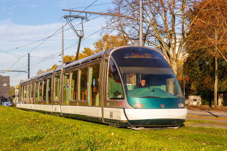 Strasbourg, France - October 29, 2021: Modern light rail tram model Eurotram public transport transit transportation traffic in Strasbourg, France.のeditorial素材