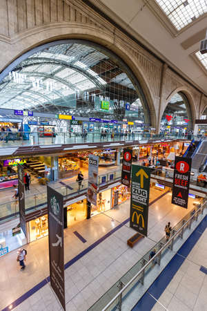Leipzig, Germany - August 19, 2020: Leipzig main railway station Hauptbahnhof Hbf Deutsche Bahn DB hall with shops portrait format in Germany.のeditorial素材