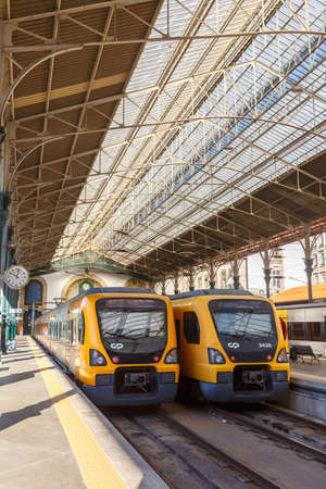 Porto, Portugal - September 22, 2021: Trains at Porto Sao Bento railway station public transport transit in Portugal.のeditorial素材