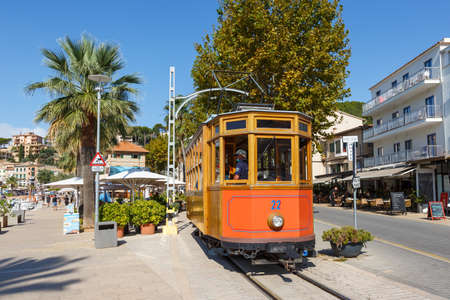 Port de Soller, Spain - October 21, 2021: Ancient tram Tranvia de Soller public transport transit transportation traffic on Mallorca in Port de Soller, Spain.のeditorial素材