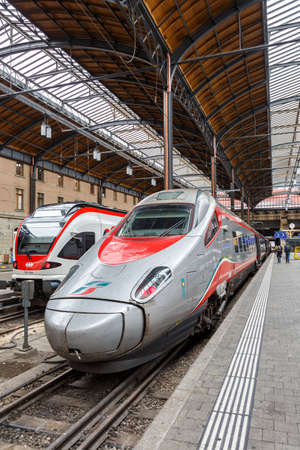 Basel, Switzerland - September 20, 2021: Alstom Trenitalia ETR 610 high-speed train at Basel SBB Railway Station portrait format in Switzerland.のeditorial素材