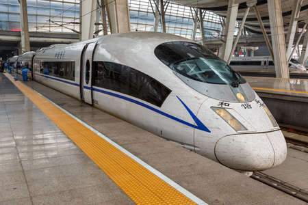 Beijing, China - September 18, 2013: Siemens Velaro CN CRH3 high-speed train at Beijing South Railway Station in China.のeditorial素材