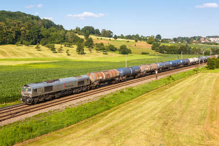 Uhingen, Germany - July 21, 2021: Cargo freight train of RheinCargo in Uhingen, Germany.のeditorial素材