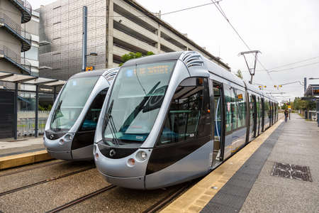 Toulouse, France - September 21, 2021: Modern light rail trams model Alstom Citadis public transport transit at Blagnac airport in Toulouse, France.のeditorial素材