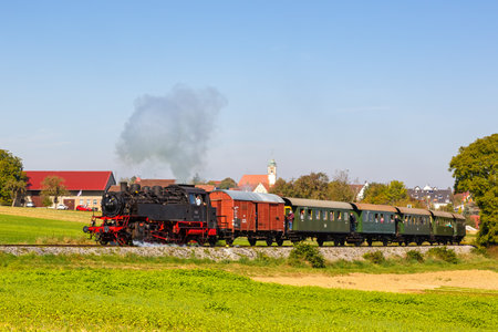 Heimerdingen, Germany - October 10, 2021: Steam train locomotice railway engine of StrohgÃ¤ubahn in Heimerdingen, Germany.のeditorial素材