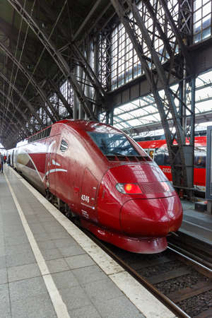 Cologne, Germany - August 3, 2021: Thalys high-speed train at Cologne KÃ¶ln main railway station Hauptbahnhof Hbf portrait format in Germany.のeditorial素材
