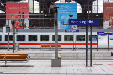Hamburg, Germany - April 21, 2021: InterCity train at Hamburg main railway station Hauptbahnhof Hbf Deutsche Bahn DB in Germany.のeditorial素材
