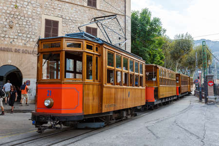 Soller, Spain - October 21, 2021: Ancient tram Tranvia de Soller public transport transit transportation traffic on Mallorca in Spain.のeditorial素材