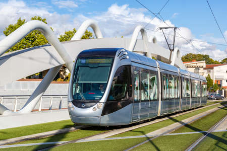 Toulouse, France - September 20, 2021: Modern light rail tram model Alstom Citadis public transport transit transportation traffic in Toulouse, France.のeditorial素材