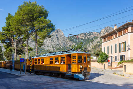 Bunyola, Spain - October 21, 2021: Ancient train Tren de Soller public transport transit transportation railway on Mallorca in Bunyola, Spain.のeditorial素材