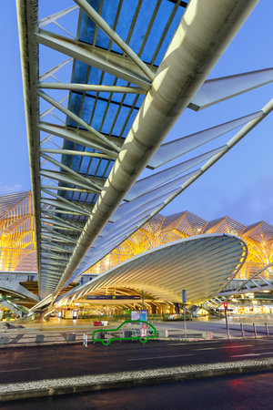 Lisbon, Portugal - September 25, 2021: Lisbon Lisboa Oriente railway station modern architecture portrait format at night in Portugal.のeditorial素材