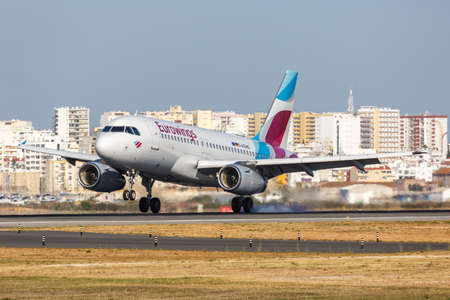 Faro, Portugal - September 25, 2021: Eurowings Airbus A319 airplane at Faro airport (FAO) in Portugal.のeditorial素材