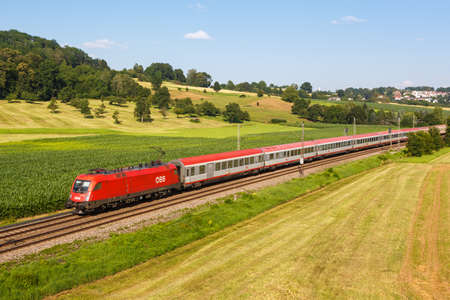 Uhingen, Germany - July 21, 2021: InterCity IC train of ÃBB Ãsterreichische Bundesbahnen in Uhingen, Germany.のeditorial素材
