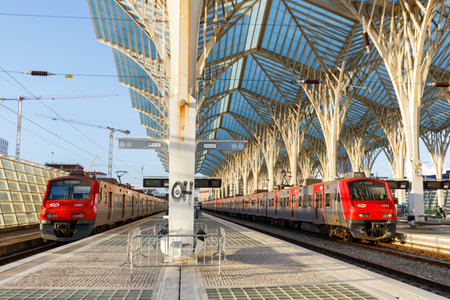 Lisbon, Portugal - September 23, 2021: Train trains at Lisbon Lisboa Oriente railway station modern architecture in Portugal.のeditorial素材