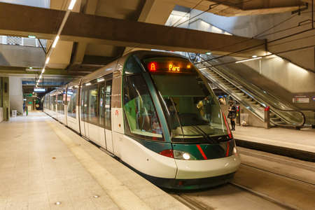 Strasbourg, France - October 29, 2021: Modern light rail tram model Alstom Citadis public transport transit transportation underground station Gare Centrale in Strasbourg, France.のeditorial素材