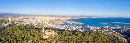 Castell de Bellver castle with Palma de Mallorca and harbor travel traveling holidays vacation aerial photo panorama view in Spainのeditorial素材