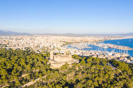 Castell de Bellver castle with Palma de Mallorca and harbor travel traveling holidays vacation aerial photo view in Spainのeditorial素材