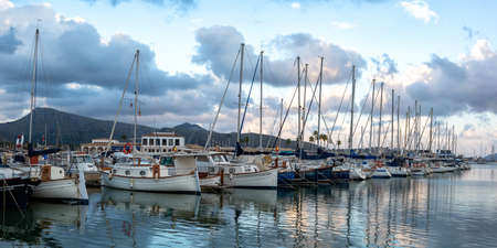 Port de Pollenca marina with sailing boats sailboats on Mallorca travel traveling holidays vacation panorama in boat Spainのeditorial素材