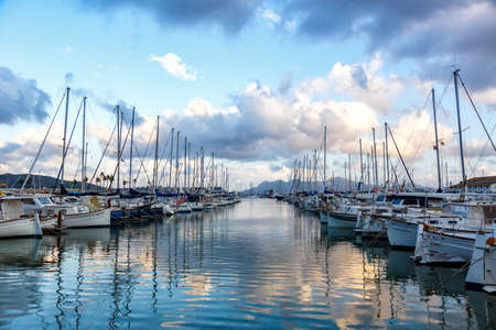 Port de Pollenca marina with sailing boats sailboats on Mallorca travel traveling holidays vacation boat in Spainのeditorial素材