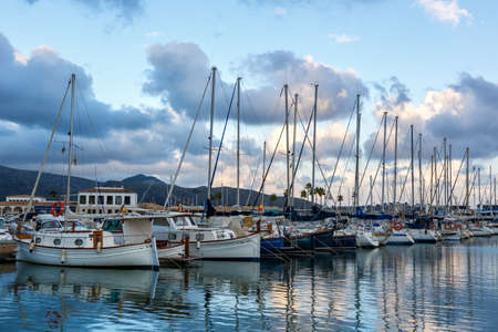 Port de Pollenca marina with sailing boats sailboats on Mallorca travel traveling holidays vacation boat in Spainのeditorial素材