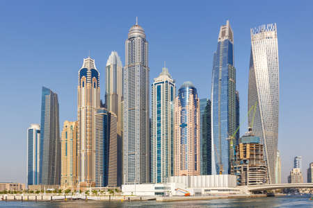 Dubai Marina and Harbor skyline architecture wealth luxury travel in United Arab Emirates modernのeditorial素材