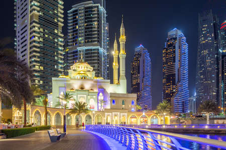 Mosque at Dubai Marina skyline architecture wealth luxury travel at night in United Arab Emirates Islamのeditorial素材