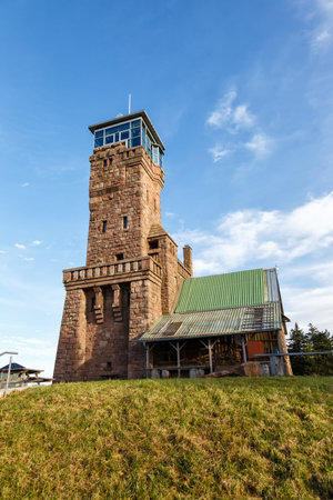 Hornisgrindeturm tower on top summit peak of Hornisgrinde mountain in Seebach in the Black Forest Schwarzwald autum fall portrait format in Germany parkのeditorial素材
